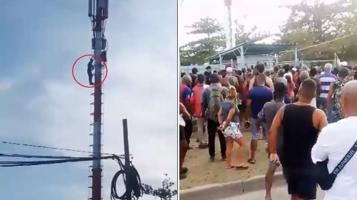 Cubano protesta desde lo alto de  una torre de  energía  contra apagones