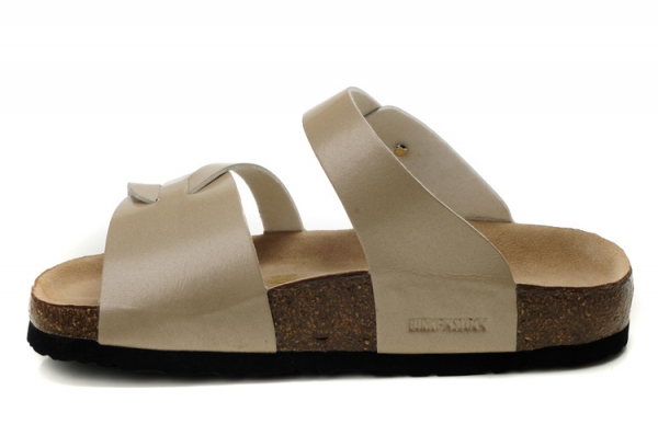 along side birkenstock's trademark cork sole